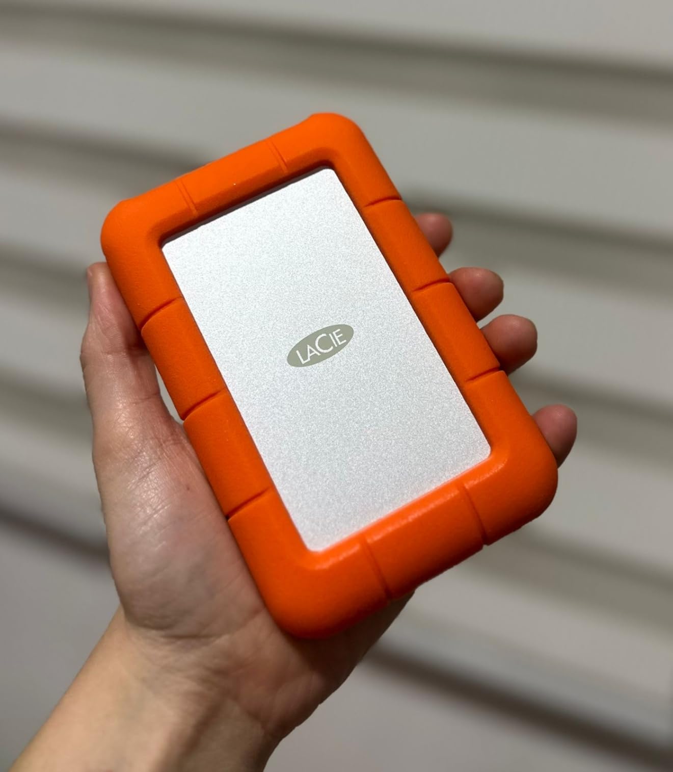 LaCie Rugged Mini 2TB External Hard Drive Portable HDD - USB 3.0/ 2.0 Compatible, Drop Shock Dust Rain Resistant Shuttle Drive, For Mac And PC Computer (LAC9000298), orange - Customer Photo 2