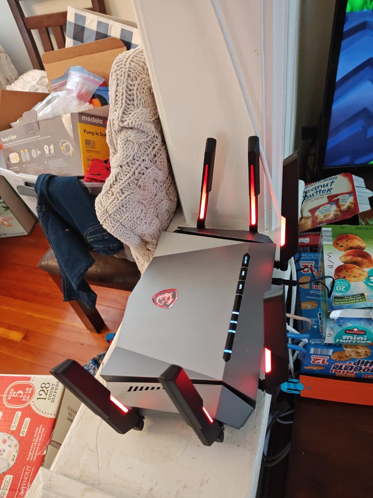 MSI Radix AXE6600 WiFi 6E Tri-Band Gaming Router, AI QoS, RGB, 1.8GHz Quad-Core Processor, MU-MIMO, Gigabit Wireless, 8-Stream, High Speed Long Range - Customer Photo 1
