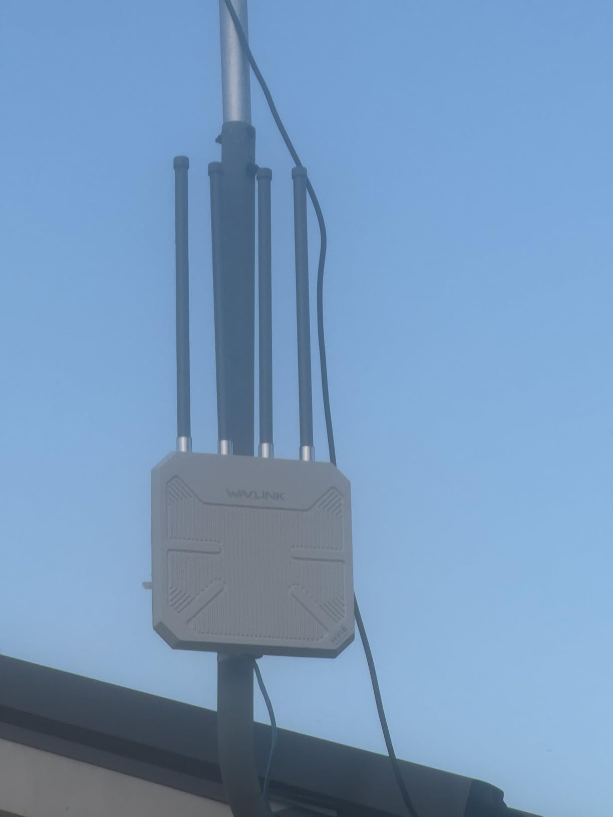 WAVLINK AX1800 Outdoor WiFi 6 Extender, IP67 Weatherproof Outdoor Access Point, High Power Long Range WiFi Extender Signal Booster, 4x8dBi Antennas, Compatible Starlink for Farm, Yard, RV, Campsite - Customer Photo 1