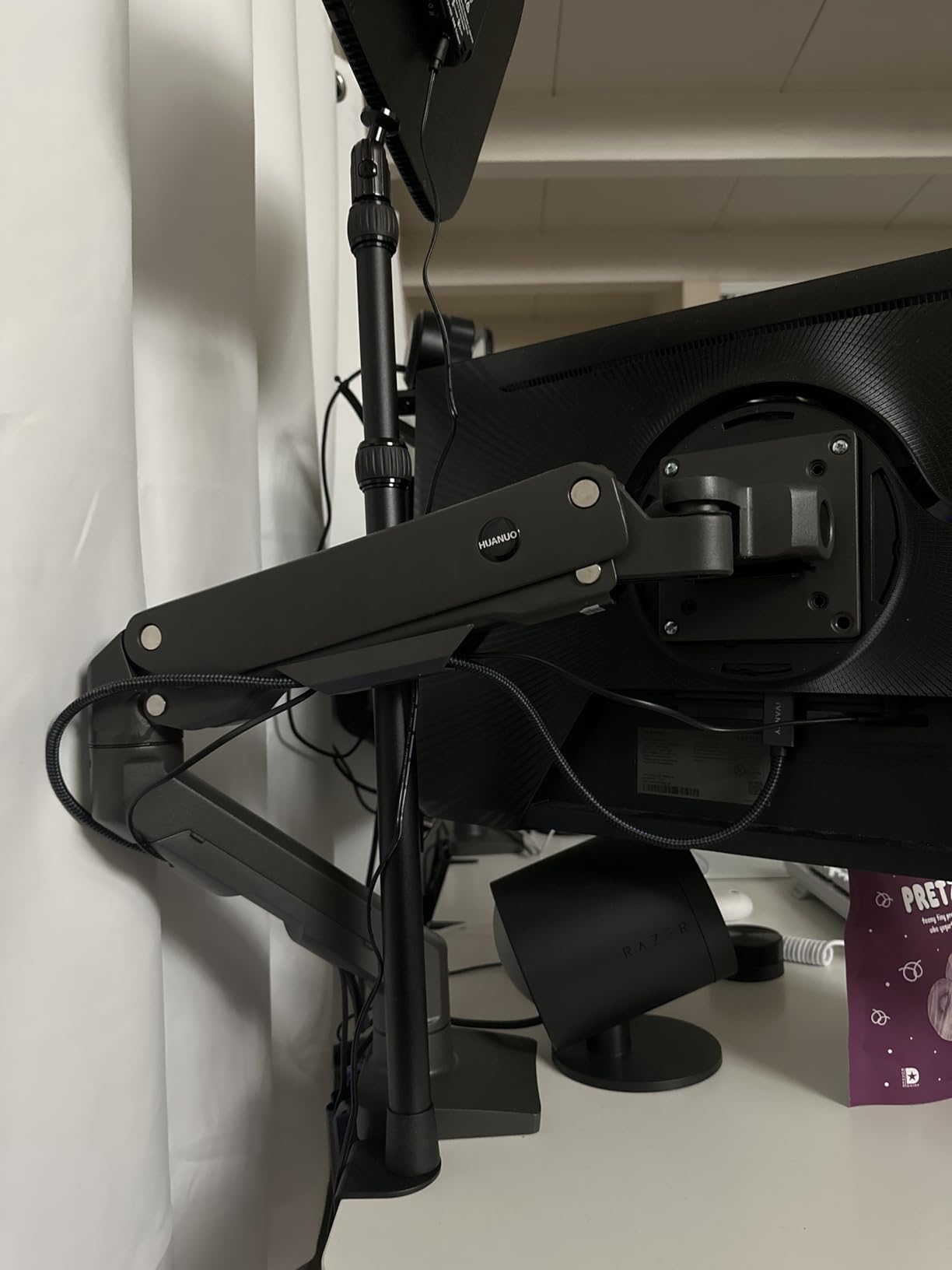 HUANUO Heavy Duty Monitor Arm for 49 inches Screens up to 35 lbs, Aluminum Ultrawide Screen Arm for Samsung Odyssey G9 and More, Fully Adjustable Monitor Stand for Desk, VESA 100x100mm, Black - Customer Photo 2
