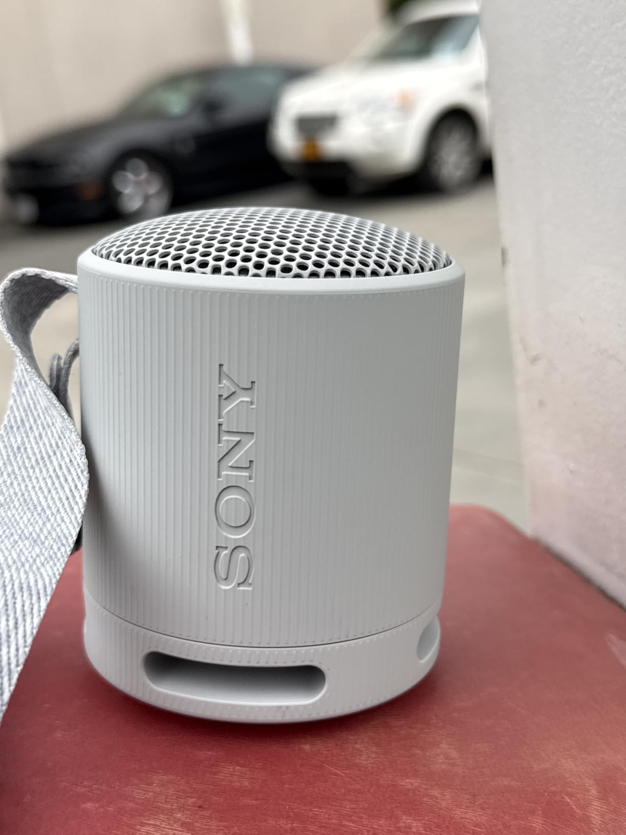 Sony SRS-XB100 Wireless Bluetooth Portable Lightweight Super-Compact Travel Speaker, Durable IP67 Waterproof & Dustproof Shower Speaker, 16 Hour Battery, Versatile Strap, & Hands-free Calling, Black customer photo 2