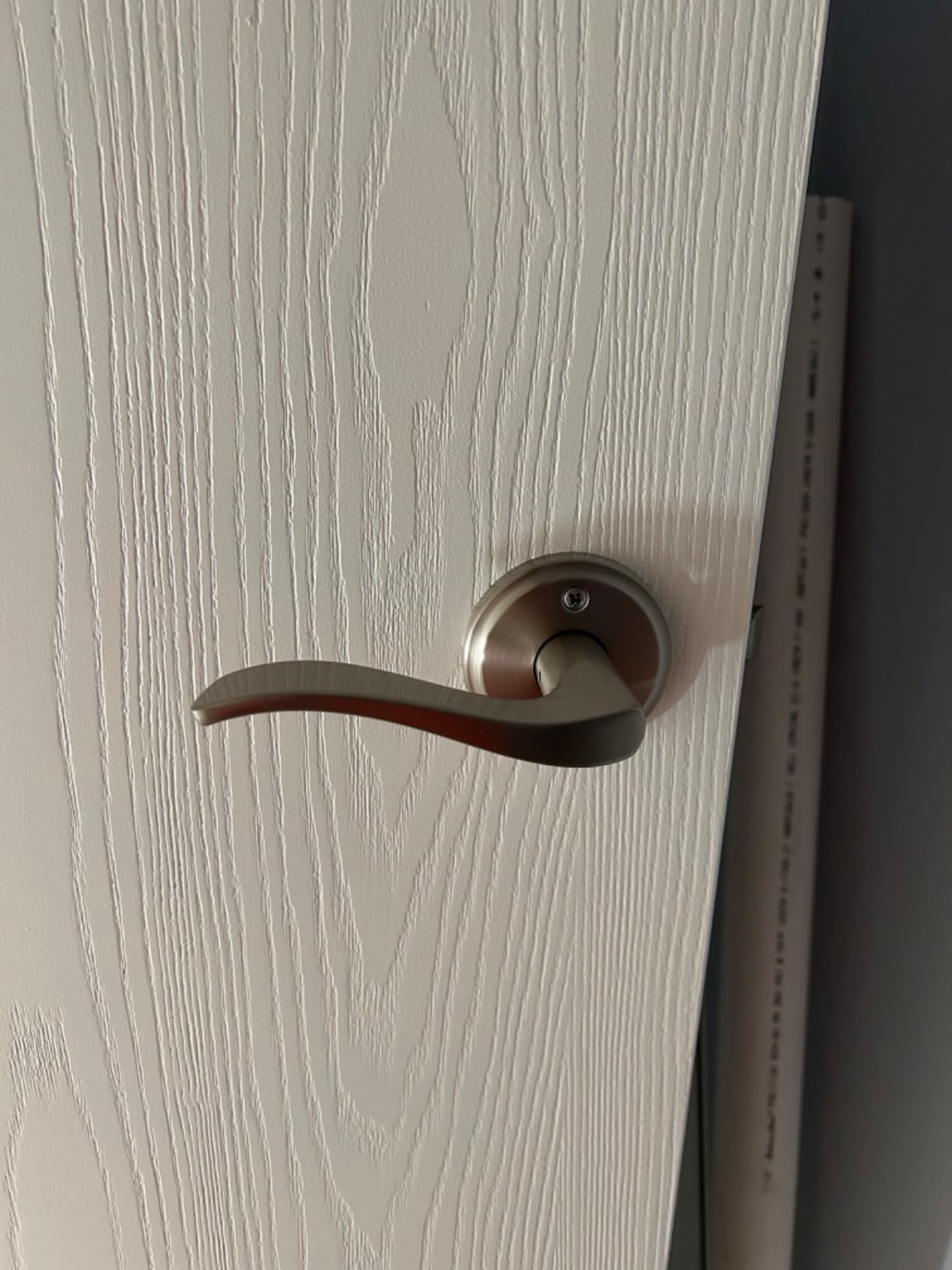 Kwikset Sedona Interior Passage Door Handle, Lever for Closet and Hallway Doors, Reversible Non-Locking Handle Lever, Satin Brass, with Microban Protection customer photo 1