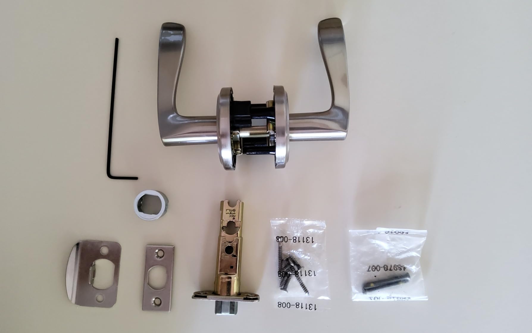 Kwikset Sedona Interior Passage Door Handle, Lever for Closet and Hallway Doors, Reversible Non-Locking Handle Lever, Satin Brass, with Microban Protection customer photo 2