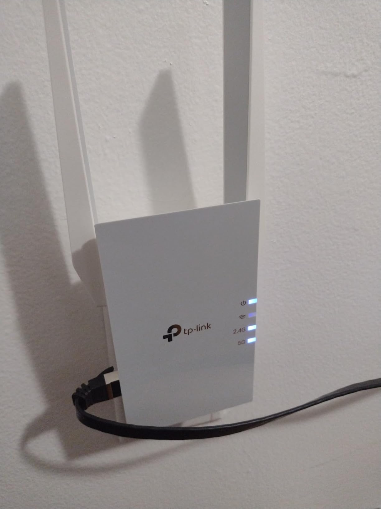 TP-Link AX1500 WiFi Extender Internet Booster(RE500X), WiFi 6 Range Extender Covers up to 1500 sq.ft and 25 Devices,Dual Band, AP Mode w/Gigabit Port, APP Setup, OneMesh Compatible customer photo 1
