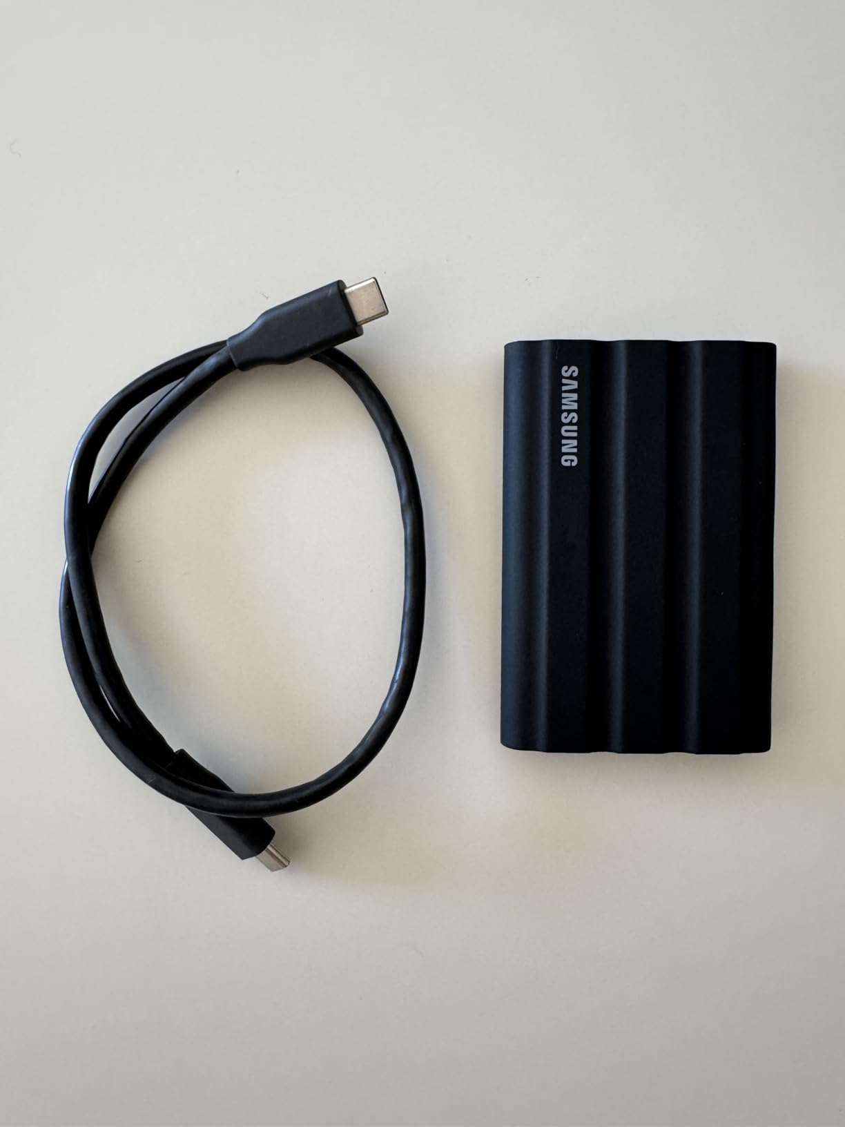 Samsung T7 Shield Portable SSD 1TB, USB 3.2 Gen 2, Up to 1,050 MB/s, Rugged, IP65 Water Resistant, External Solid State Drive for Photographers, Content Creaters and Gaming (MU-PE1T0S/AM), Black customer photo 2