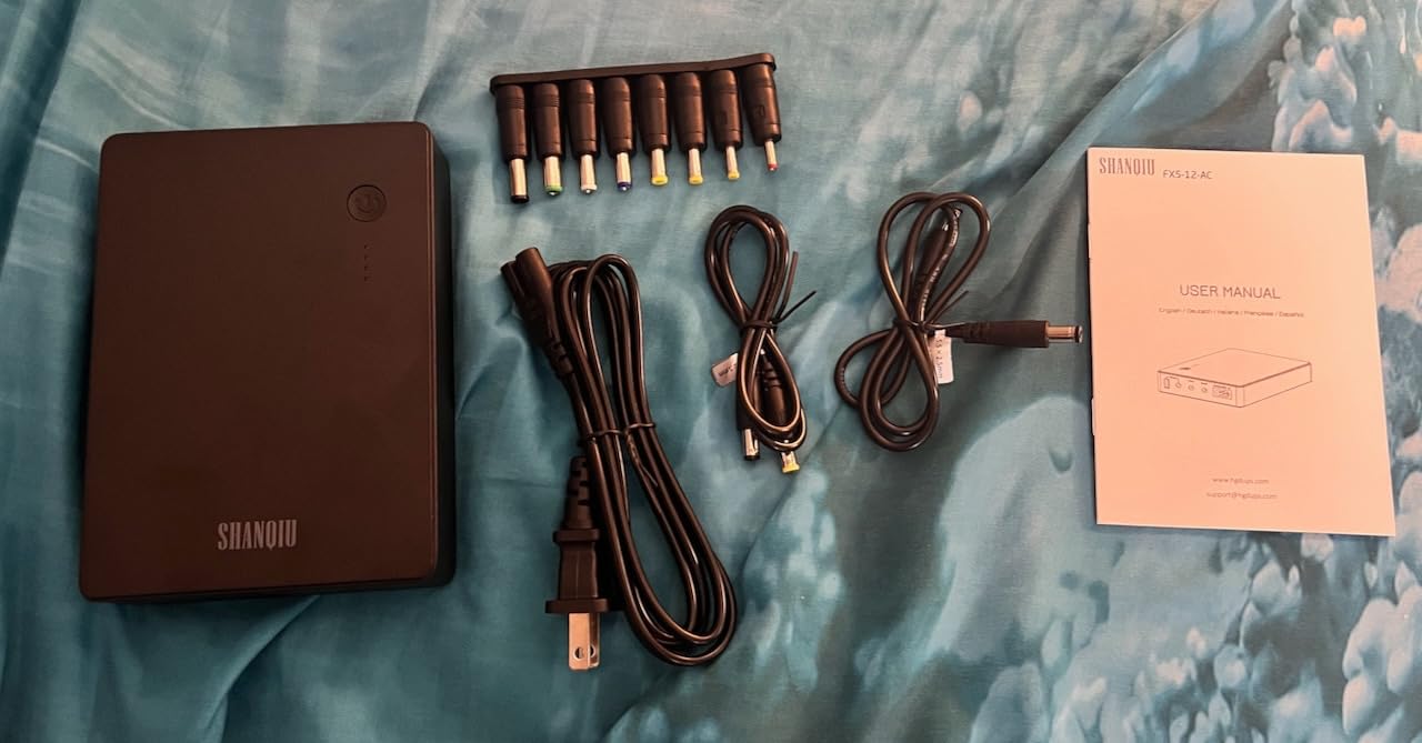 Mini UPS Battery Backup Uninterruptible Power Supply for Router, Modem, Security Camera with Input AC Output USB 5V DC 5V 9V 12V (37Wh) customer photo 1