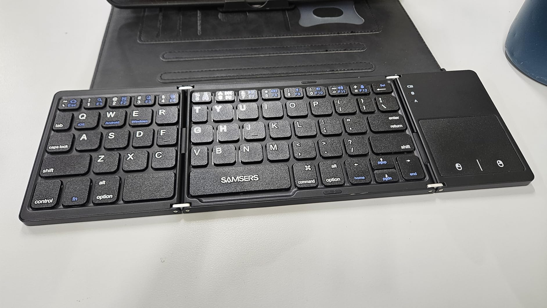 Samsers Foldable Bluetooth Keyboard with Touchpad, Ultra Slim Compact, Black, Multi-touch Trackpad, Full Size, Phone Holder, USB-C Charging, 1 Device, for Android Windows iOS Mac OS, Mobile Productivity customer photo 1