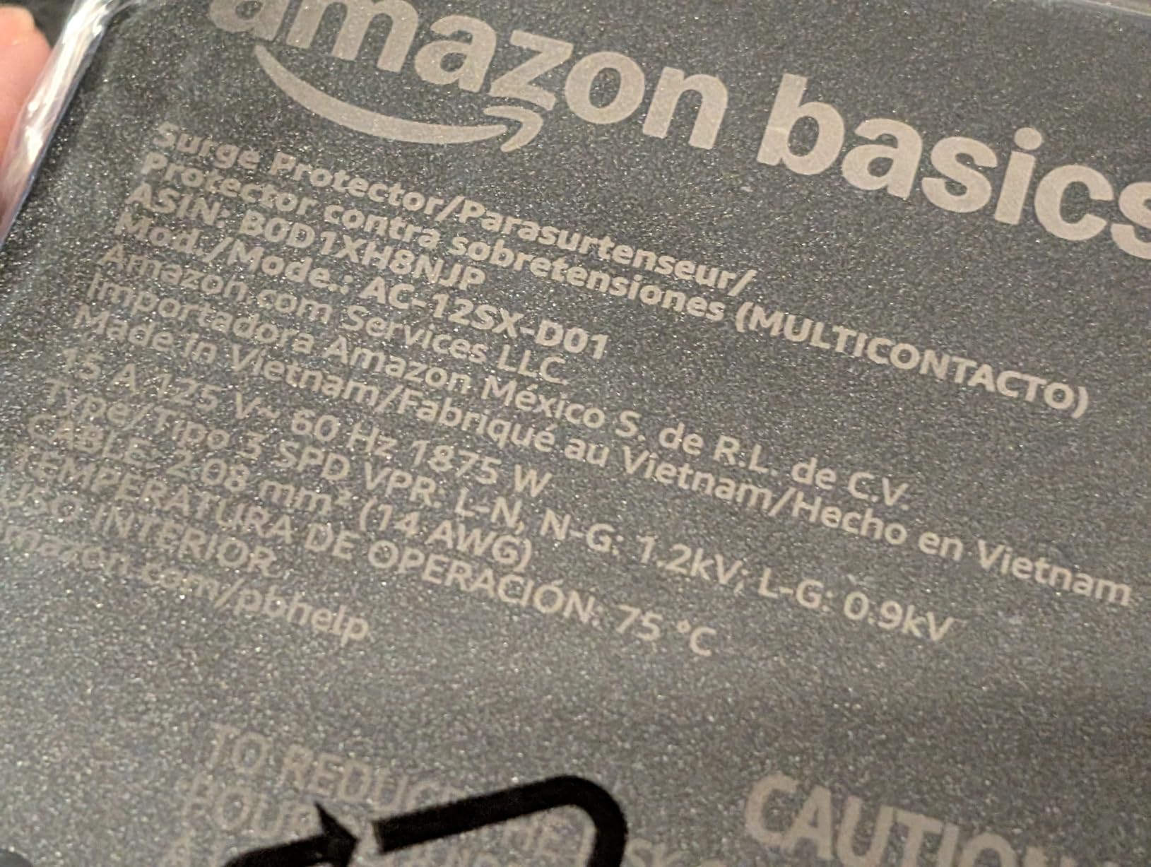 Amazon Basics 12-Outlet Surge Protector Power Strip, 4000 Joules, 8ft Extension Cord, Rectangle, for Home, Office, Gaming Room, Black customer photo 2