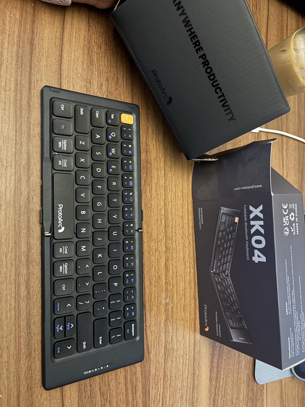 ProtoArc XK04 Foldable Compact Keyboard for Phone and Tablet, Black, Pocket-Sized, PU Leather Cover, Bluetooth 3-Device Workflow, for Business Travelers, On-the-go Typing customer photo 2